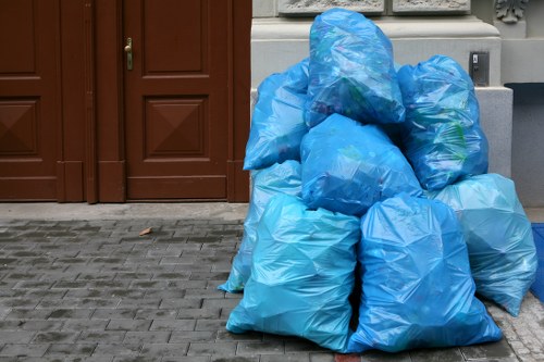 Workers sorting construction waste for recycling